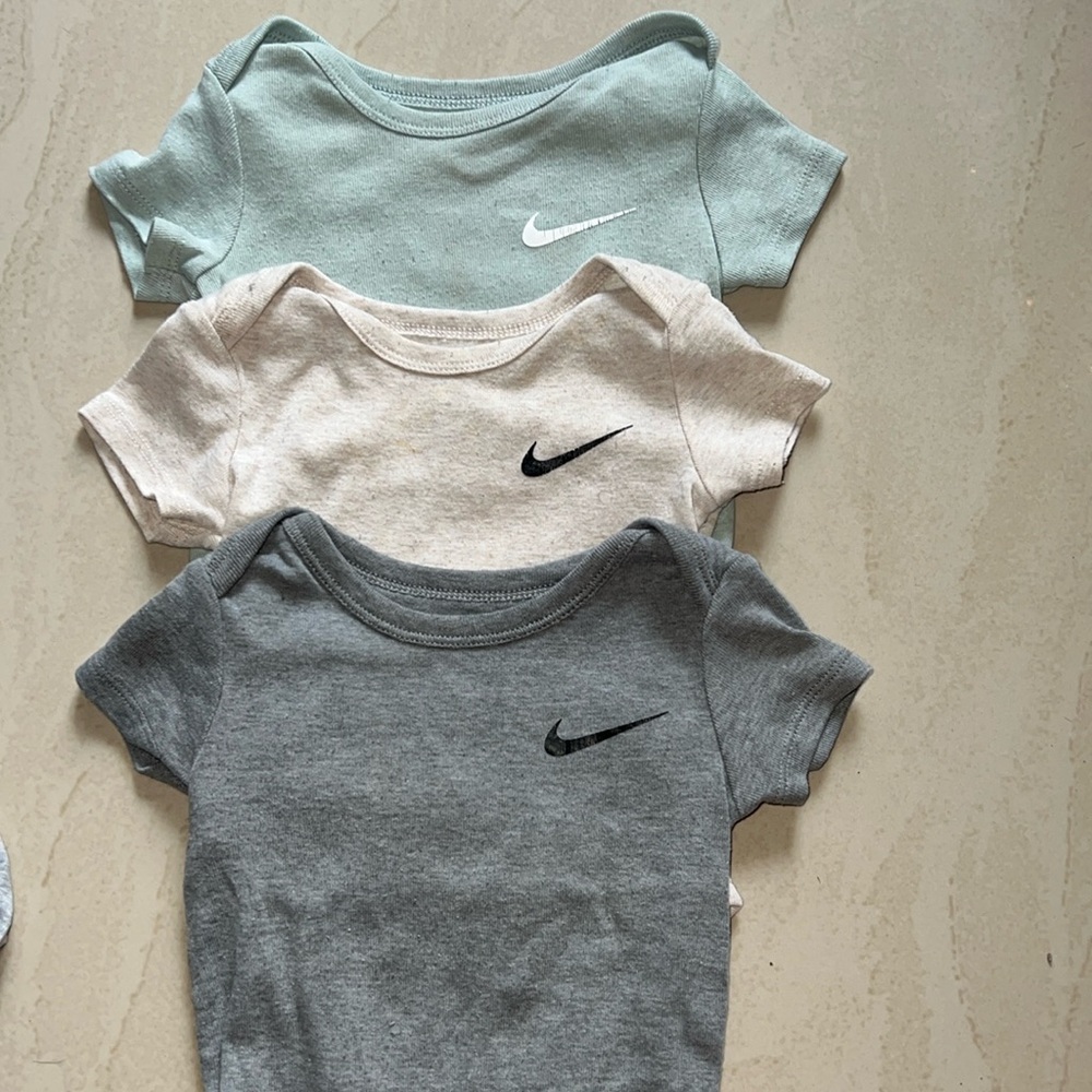 Nike baby onesies